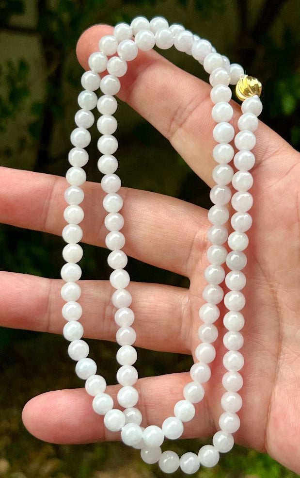 Soft glassy luster and fine crystalline texture of the 6.2mm authentic Myanmar jadeite bead necklace JN015