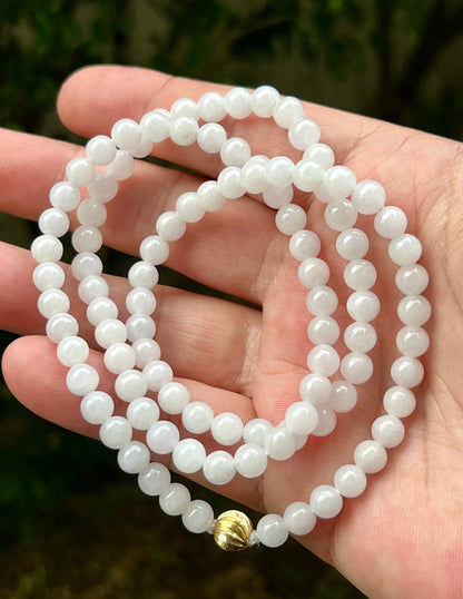 Soft glassy luster and fine crystalline texture of the 6.2mm authentic Myanmar jadeite bead necklace JN015