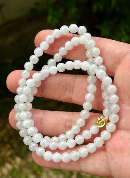 Soft glassy luster and fine crystalline texture of the 6.2mm authentic Myanmar jadeite bead necklace JN017