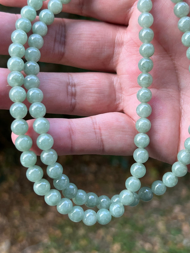 Soft glassy luster and fine crystalline texture of the 6.7mm authentic Myanmar jadeite bead necklace JN080