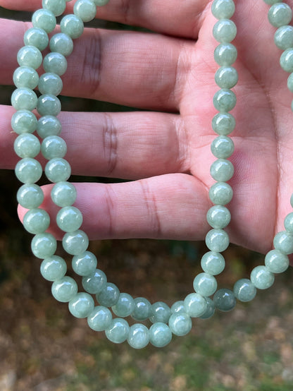 Soft glassy luster and fine crystalline texture of the 6.7mm authentic Myanmar jadeite bead necklace JN080