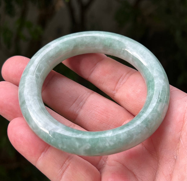 Flat inner profile of 62.1mm icy green Burmese jade bangle JB1302