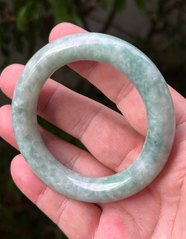 Flat inner profile of 62.1mm icy green Burmese jade bangle JB1302