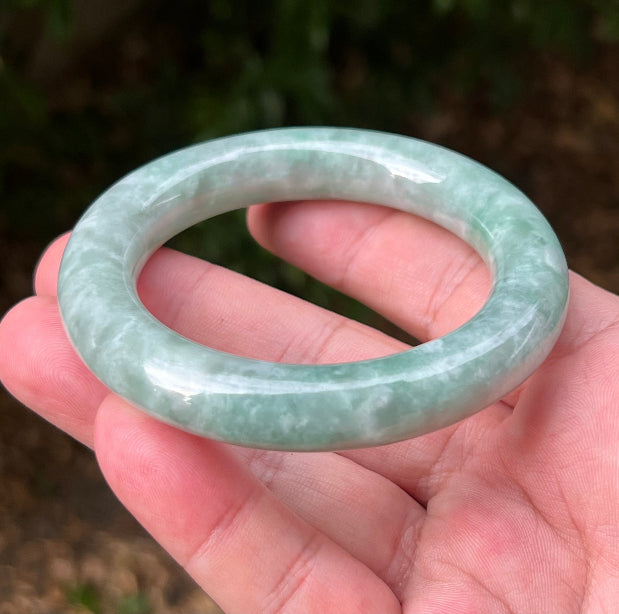 Flat inner profile of 62.1mm icy green Burmese jade bangle JB1302