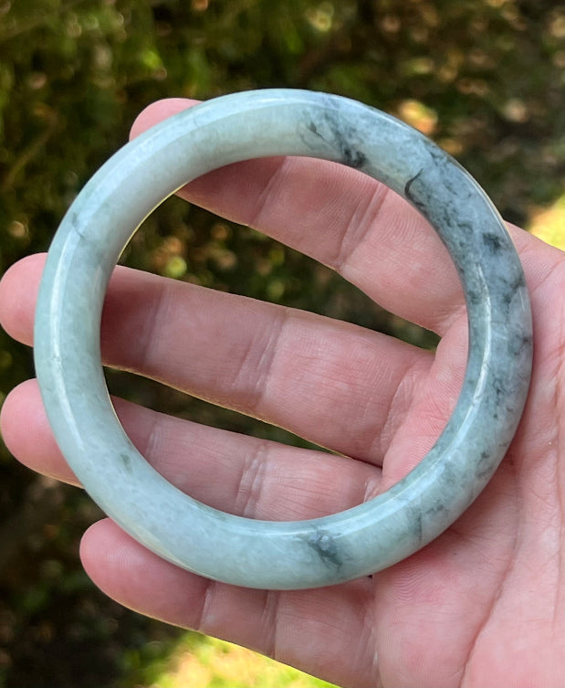 Flat inner profile of 62.1mm icy green Burmese jade bangle JB1302