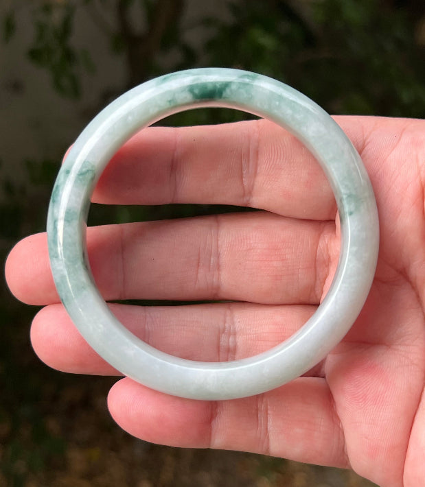 Regular round profile of 58.5mm icy green Burmese jade bangle JB1293