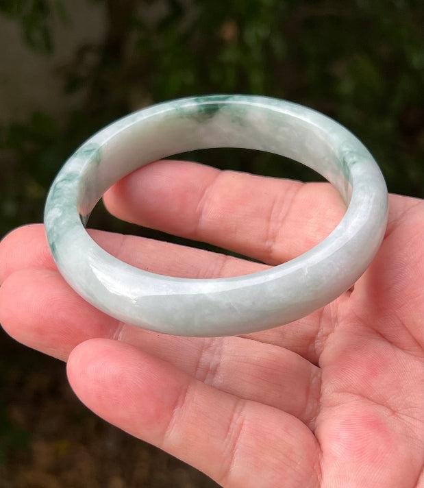 Regular round profile of 58.5mm icy green Burmese jade bangle JB1293