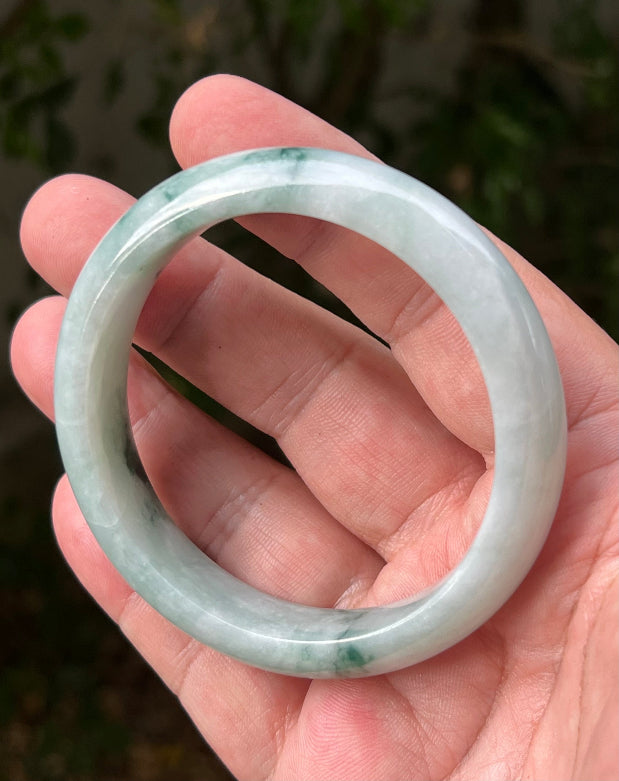 Regular round profile of 58.5mm icy green Burmese jade bangle JB1293