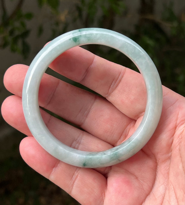 Regular round profile of 58.5mm icy green Burmese jade bangle JB1293