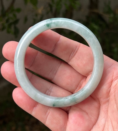 Regular round profile of 58.5mm icy green Burmese jade bangle JB1293