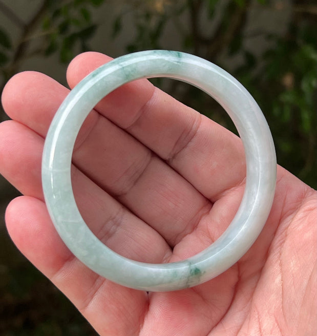 Regular round profile of 58.5mm icy green Burmese jade bangle JB1293