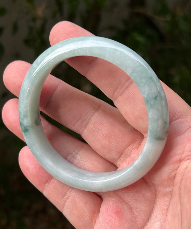 Regular round profile of 58.5mm icy green Burmese jade bangle JB1293