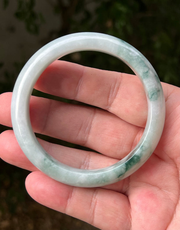 Regular round profile of 58.5mm icy green Burmese jade bangle JB1293