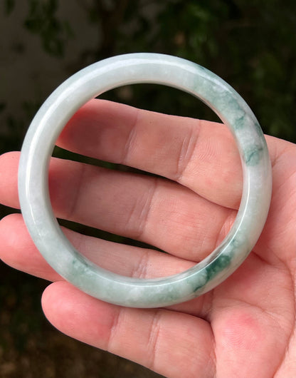 Regular round profile of 58.5mm icy green Burmese jade bangle JB1293