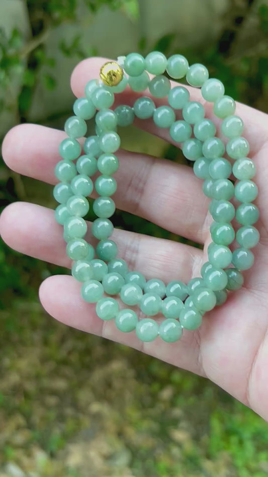 Video showcasing the soft glassy luster and elegant icy imperial white and apple green color palette of the 7.5mm certified Burmese jade bead necklace JN020