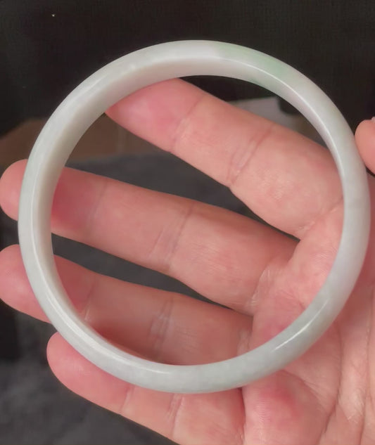 Video showcasing the vitreous luster and fine crystalline texture of icy greyish milky white and imperial green Burmese jadeite bangle JB881