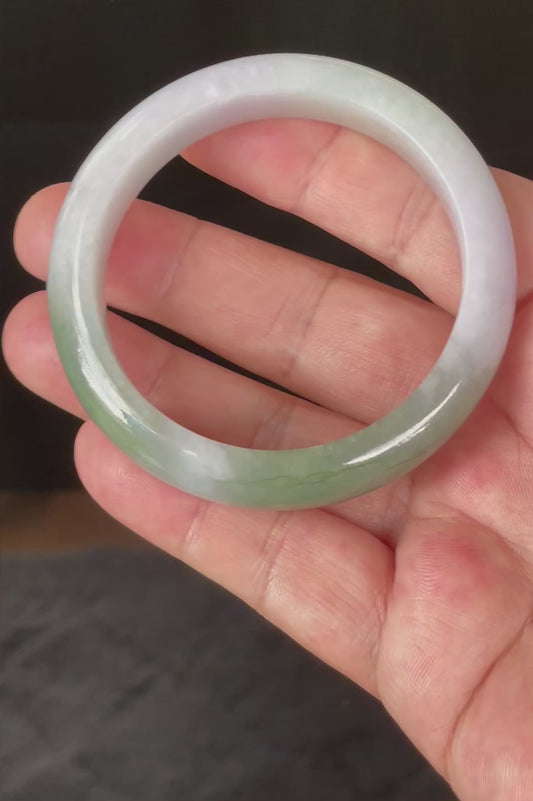 Video showcasing the vitreous luster and fine crystalline texture of icy light lavender, milky white, and apple green Burmese jadeite bangle JB854