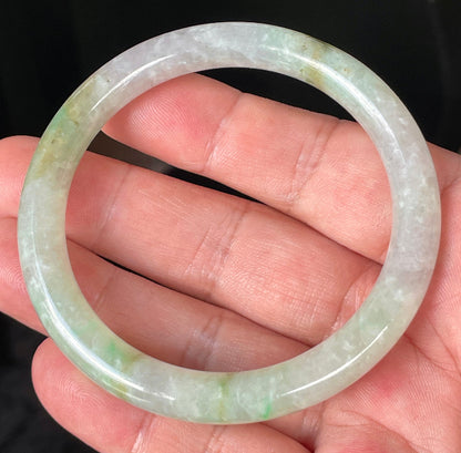 Solid icy clear, milky white, and green natural Type A Burmese jade bangle bracelet in size 58.4mm
