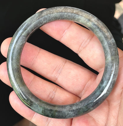 Solid icy black, grayish white, and bluish green natural Type A Burmese jade bangle bracelet in size 62.2mm