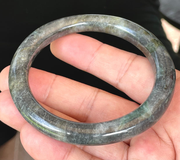 Solid icy black, grayish white, and bluish green natural Type A Burmese jade bangle bracelet in size 62.2mm