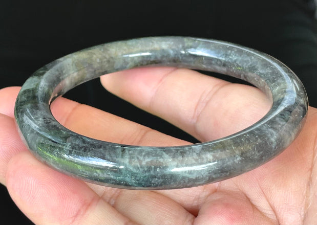 Solid icy black, grayish white, and bluish green natural Type A Burmese jade bangle bracelet in size 62.2mm