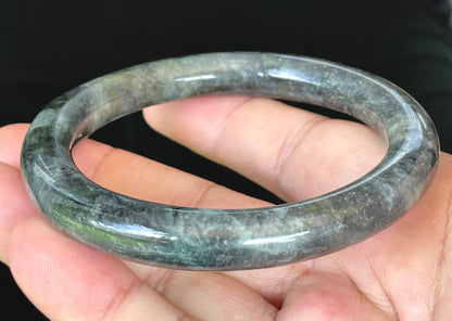 Solid icy black, grayish white, and bluish green natural Type A Burmese jade bangle bracelet in size 62.2mm