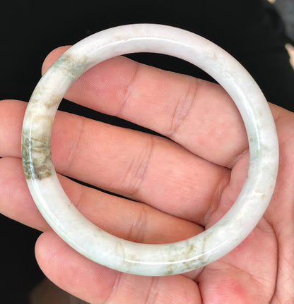 Solid icy milky white and apple green natural Type A Burmese jade bangle bracelet in size 58.5mm
