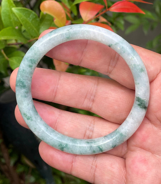 Solid icy bluish green and milky white natural Type A Burmese jade bangle bracelet in size 58.7mm