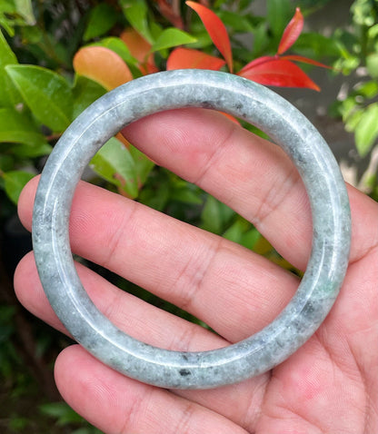Solid gray and milky white natural Type A Burmese jade bangle bracelet in size 58.6mm