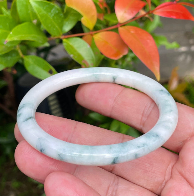 Solid milky white and imperial green natural Type A Burmese jade bangle bracelet in size 58.8mm