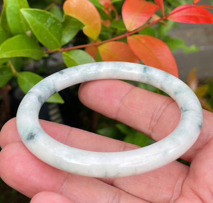 Solid milky white and imperial green natural Type A Burmese jade bangle bracelet in size 58.5mm