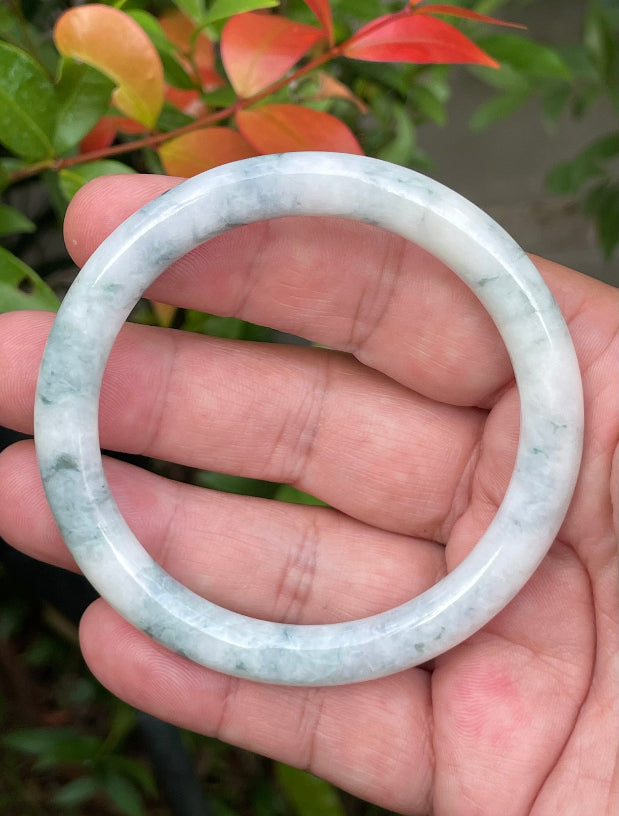 Solid icy white, imperial green, and blue natural Type A Burmese jade bangle bracelet in size 58.7mm
