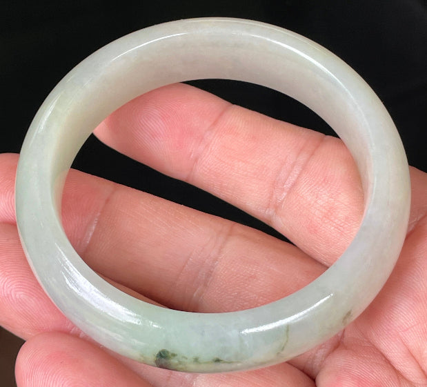 Rounded classic profile of 55mm icy light apple and forest green Burmese jade bangle JB074