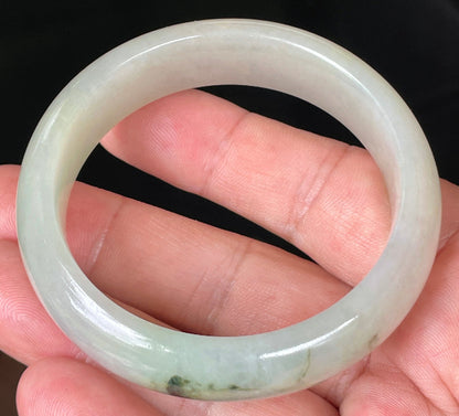 Rounded classic profile of 55mm icy light apple and forest green Burmese jade bangle JB074
