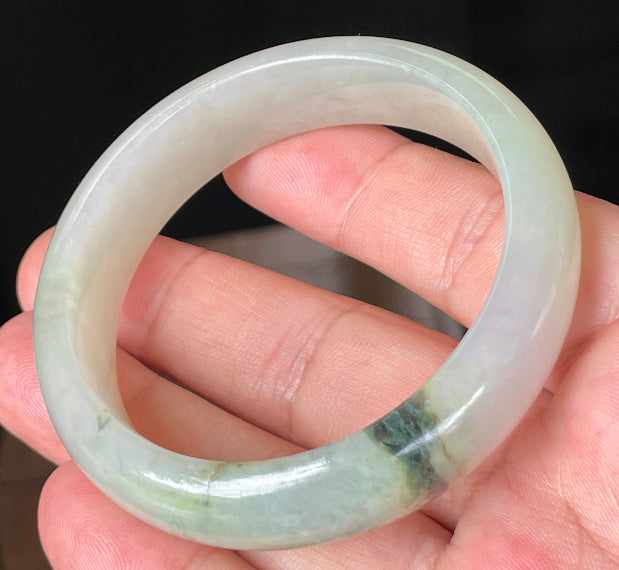 Rounded classic profile of 55mm icy light apple and forest green Burmese jade bangle JB074