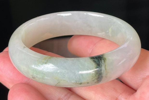 Rounded classic profile of 55mm icy light apple and forest green Burmese jade bangle JB074