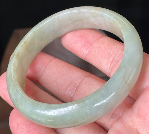 Rounded classic profile of 57.3mm icy apple green Burmese jade bangle JB073