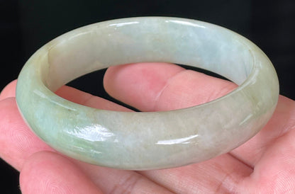 Rounded classic profile of 57.3mm icy apple green Burmese jade bangle JB073