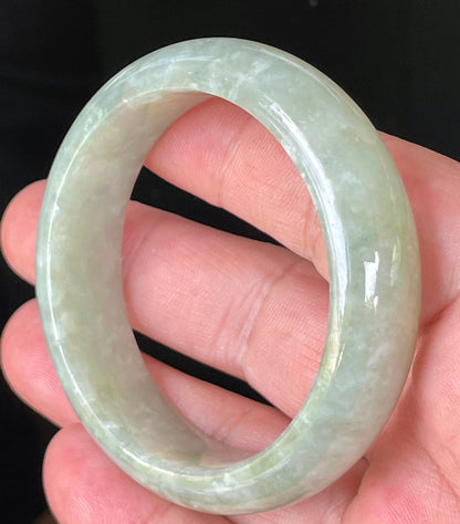 Rounded classic profile of 50.8mm icy apple green and milky white Burmese jade bangle JB238