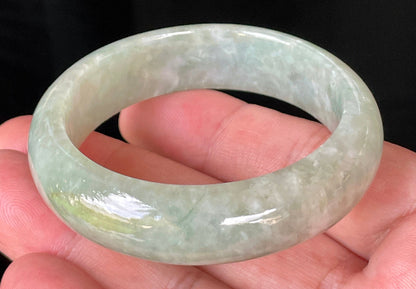 Rounded classic profile of 50.8mm icy apple green and milky white Burmese jade bangle JB238