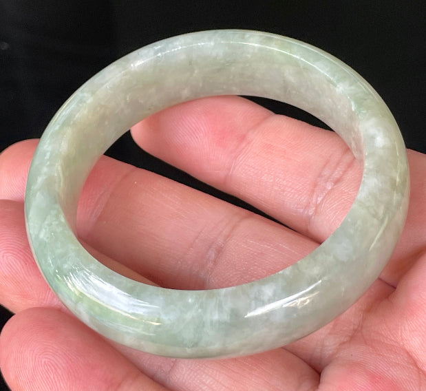 Rounded classic profile of 50.8mm icy apple green and milky white Burmese jade bangle JB238
