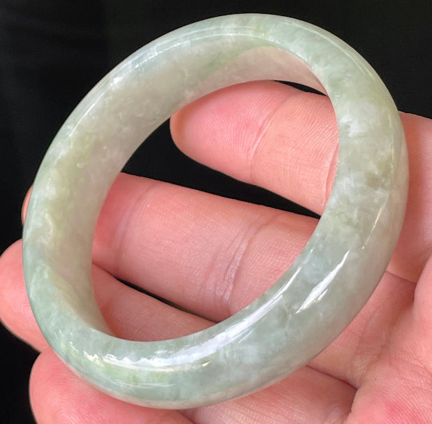 Rounded classic profile of 50.8mm icy apple green and milky white Burmese jade bangle JB238