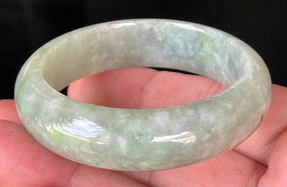 Rounded classic profile of 50.8mm icy apple green and milky white Burmese jade bangle JB238