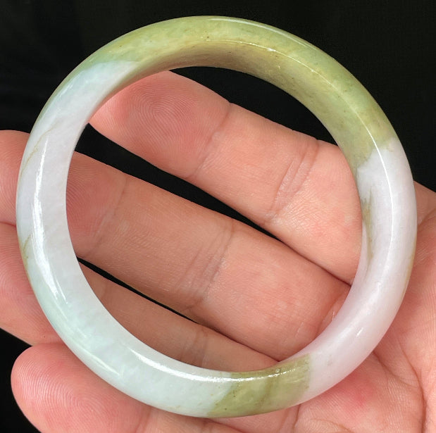 Rounded classic profile of 58.4mm icy apple green, forest green and milky white Burmese jade bangle JB078