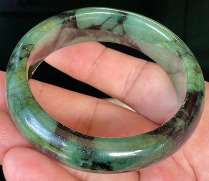 Rounded classic profile of 58mm icy forest and apple green Burmese jade bangle JB440
