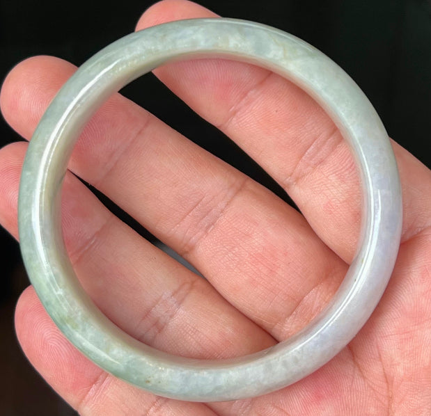 Rounded classic profile of 57.8mm icy green and milky white Burmese jade bangle JB532