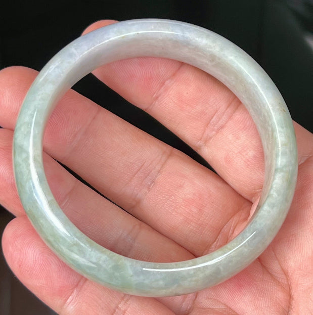 Rounded classic profile of 57.8mm icy green and milky white Burmese jade bangle JB532