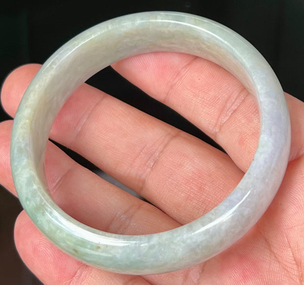 Rounded classic profile of 57.8mm icy green and milky white Burmese jade bangle JB532