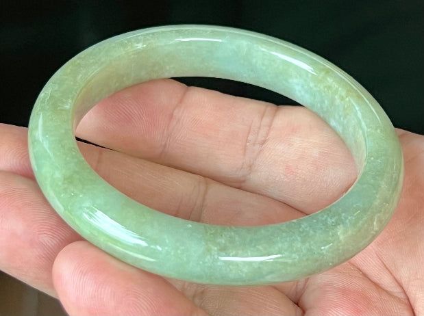 Rounded classic profile of 55.5mm icy apple green Burmese jade bangle JB558