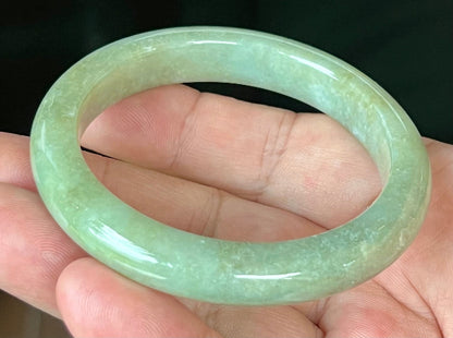 Rounded classic profile of 55.5mm icy apple green Burmese jade bangle JB558